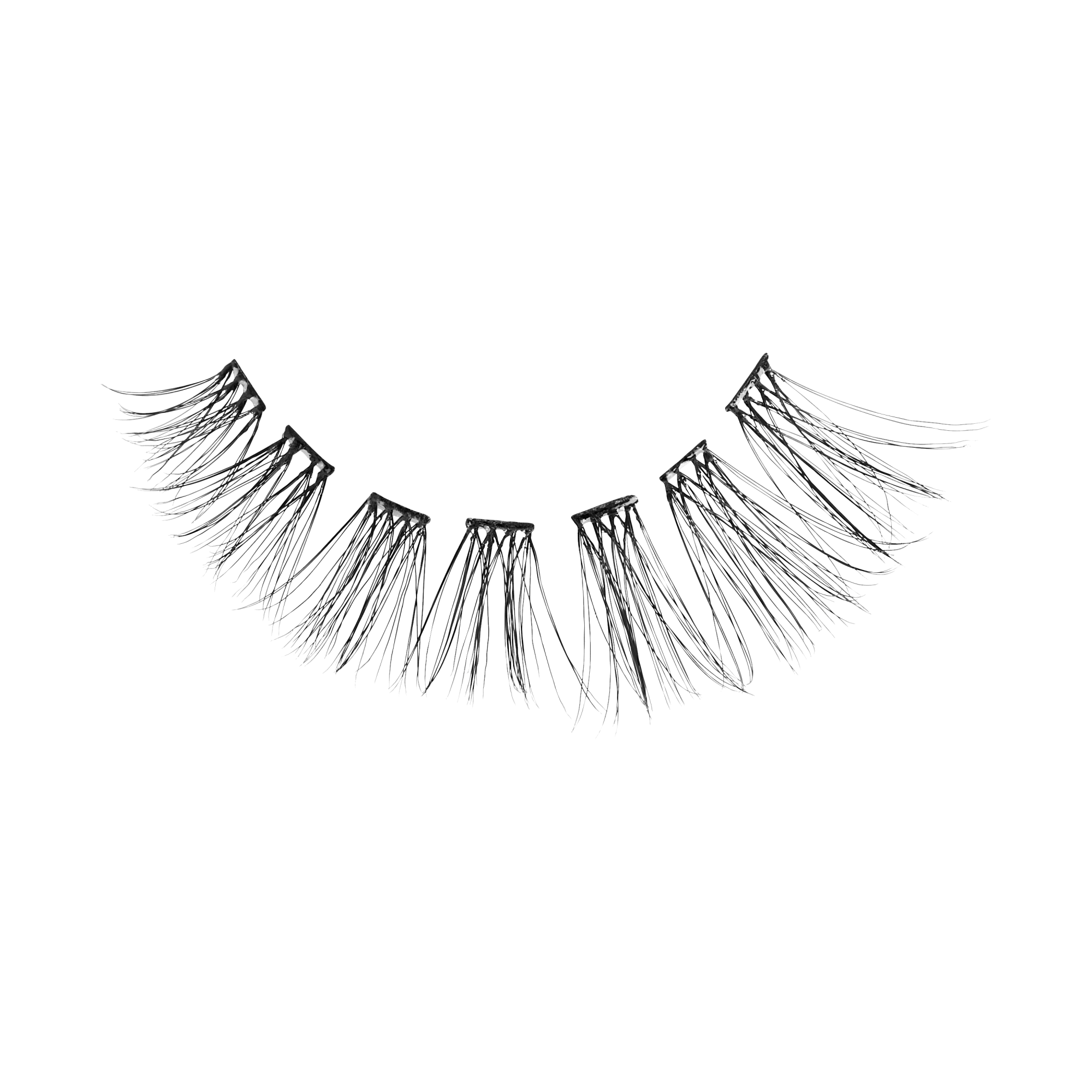 Pair of false eyelashes with layered, wispy black fibers on white background.