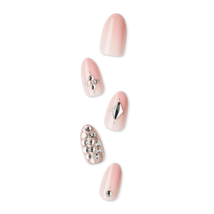 imPRESS nails in almond shapes featuring shiny nude polish and varying silver embellishments