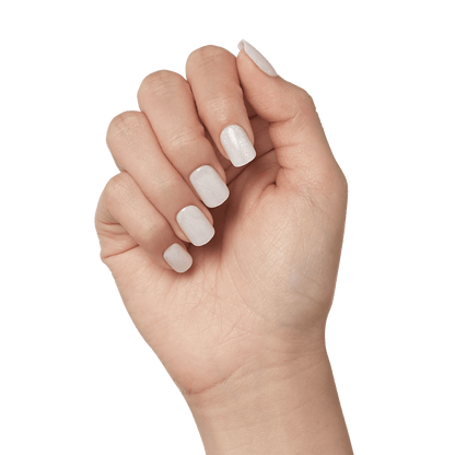 Close-up of a hand modeling imPRESS press-on nails in &