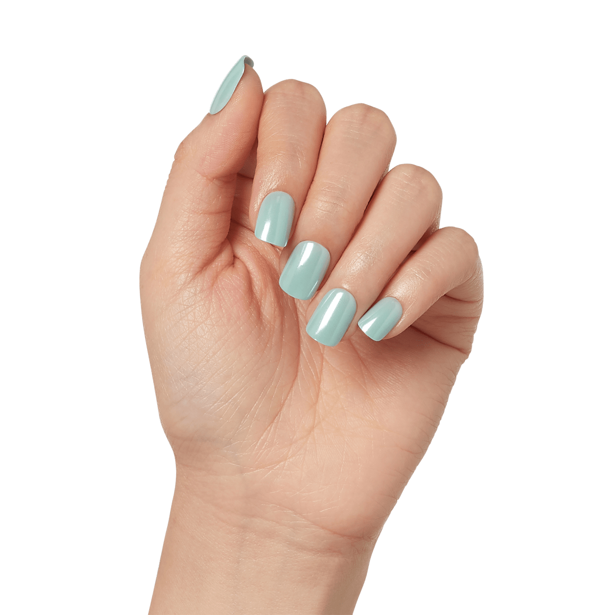 A hand modeling short, squoval press on nails in mint green with mirror, powdered effect. Nails are &