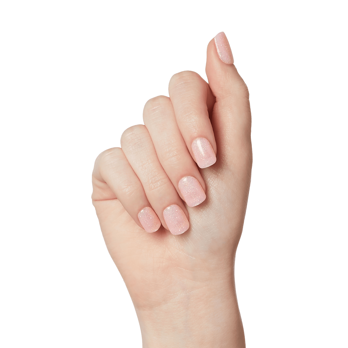 A hand modeling short, squoval nails that are light pink with glitter design. Nails are press-on from imPRESS Color FX in &