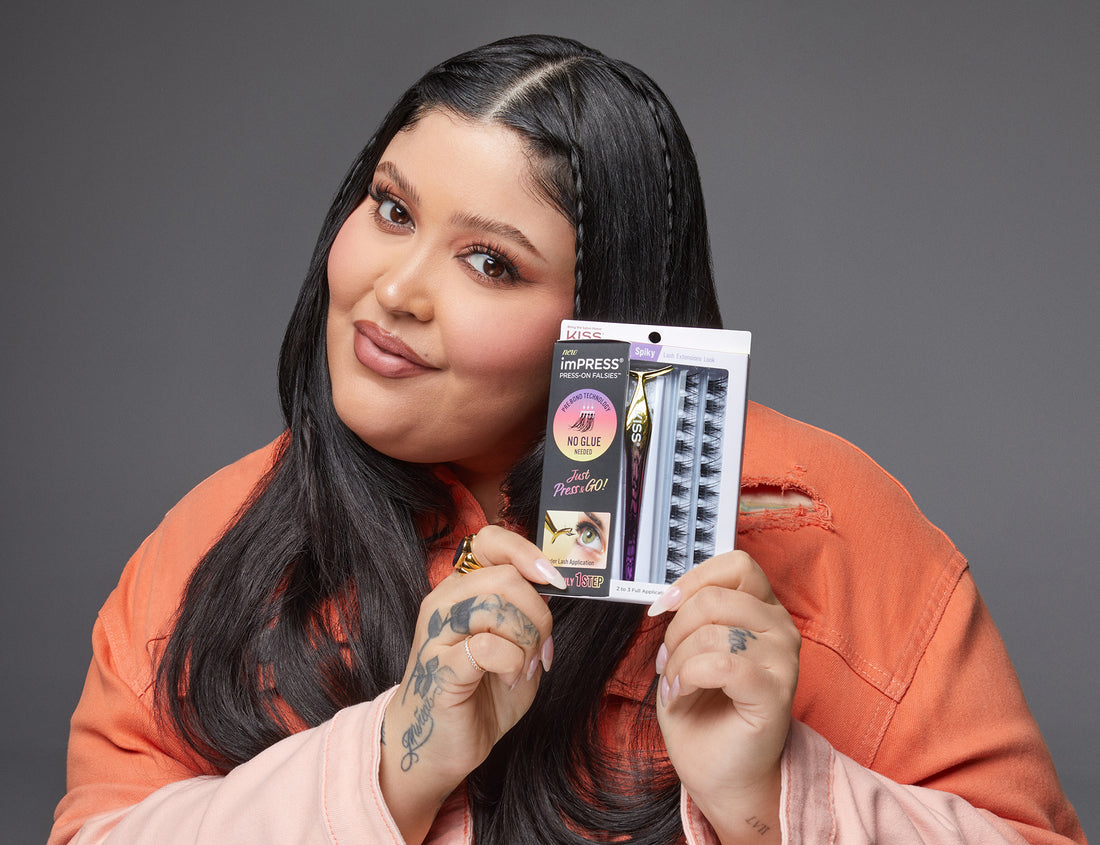 Makeup artist and imPRESS Press-On Falsies brand ambassador Priscilla Ono holding imPRESS Falsies press on lashes starter kit.