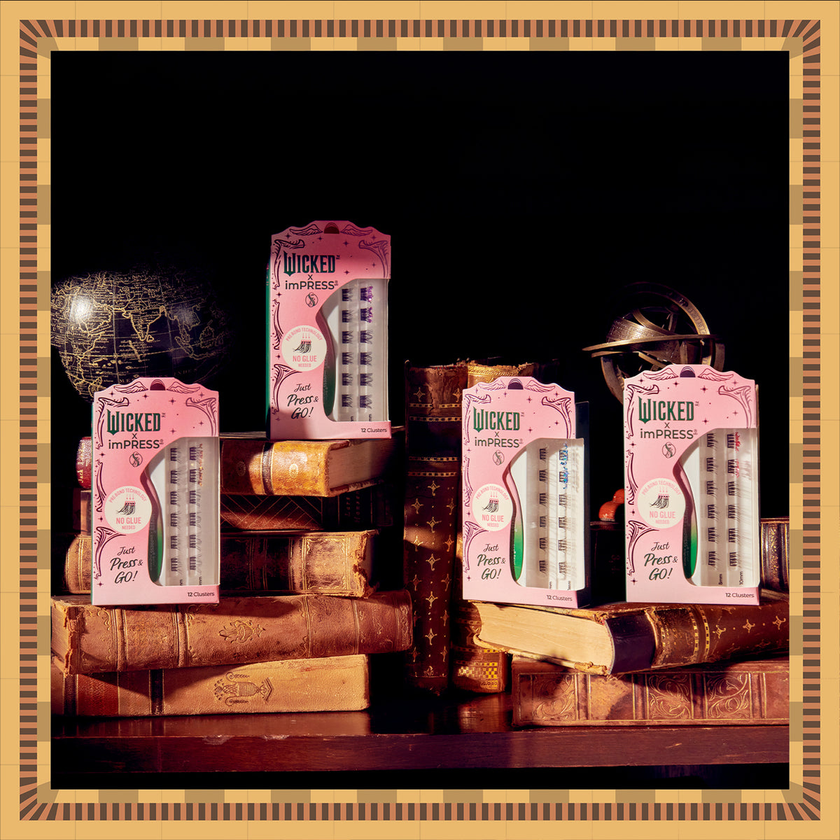 Wicked imPRESS press-on lashes collection displayed with vintage books and globe decor.