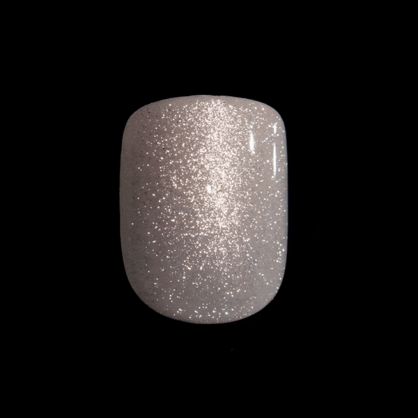 Close-up of a press-on nail in &