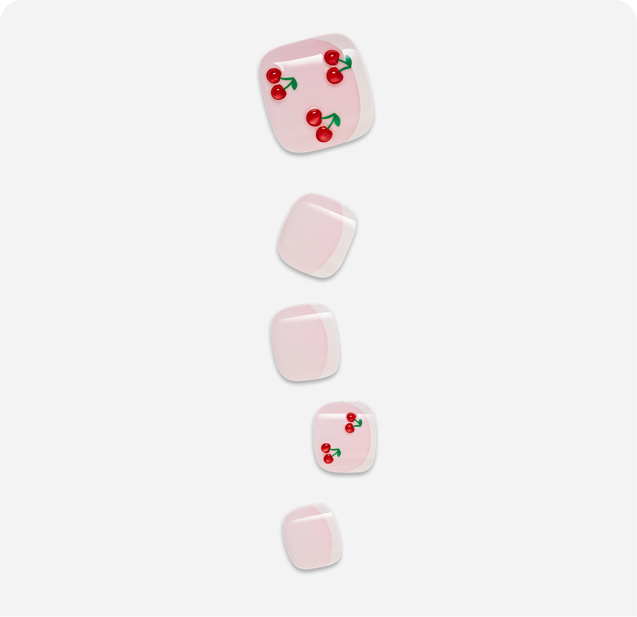 Pink nail polish strips with cherry designs and plain variants arranged vertically.
