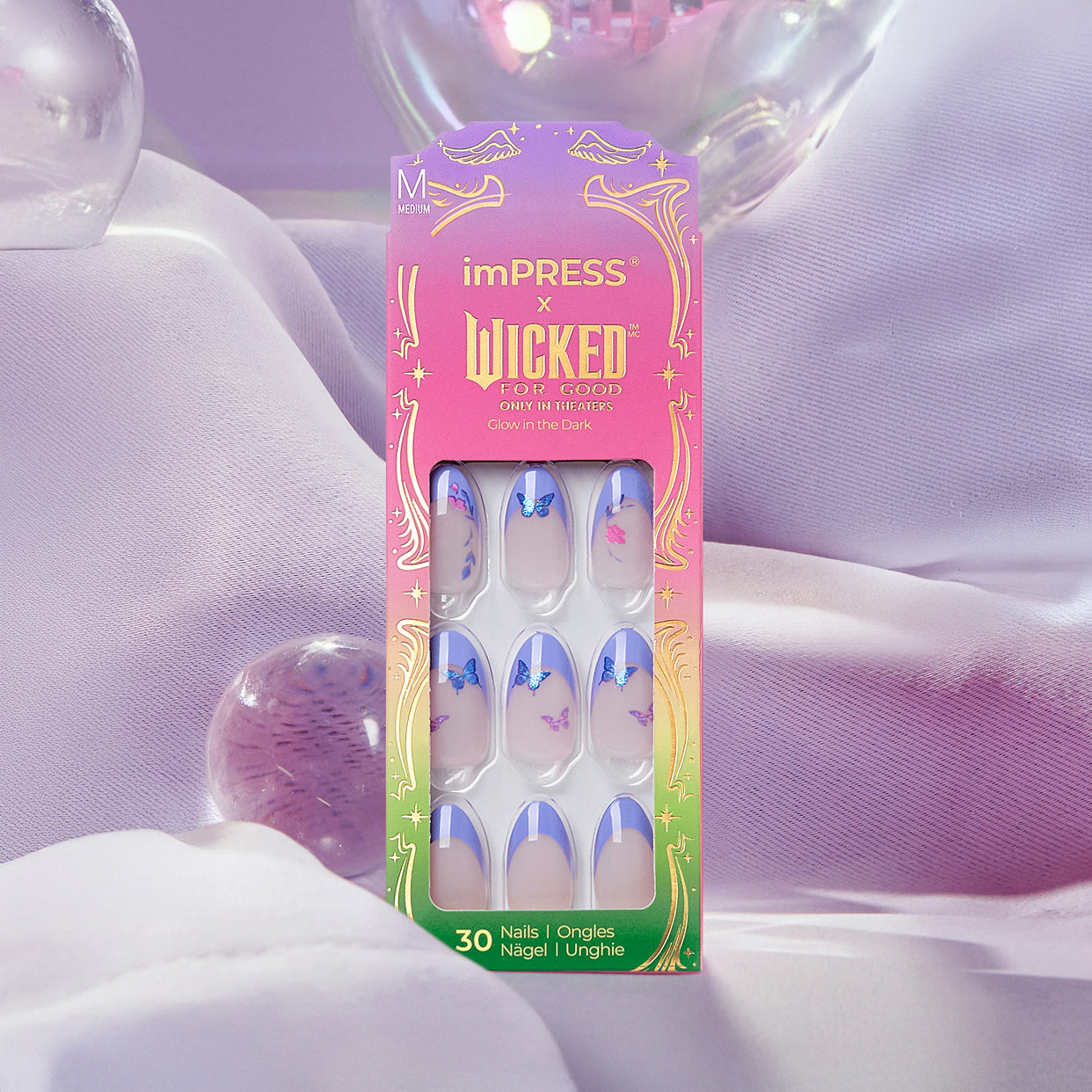 imPRESS x Wicked press-on nails in medium size, glow-in-dark design with blue butterflies