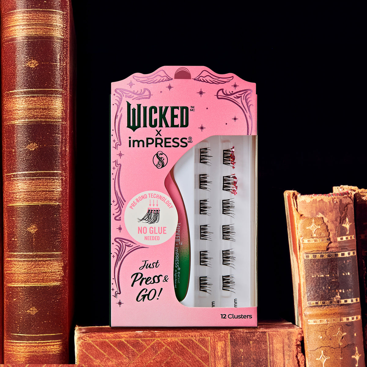 Wicked x imPRESS press-on nails, 12 clusters, pink packaging, no glue needed.