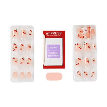 Packaging of imPRESS cherry design french tip nails with prep pad and file