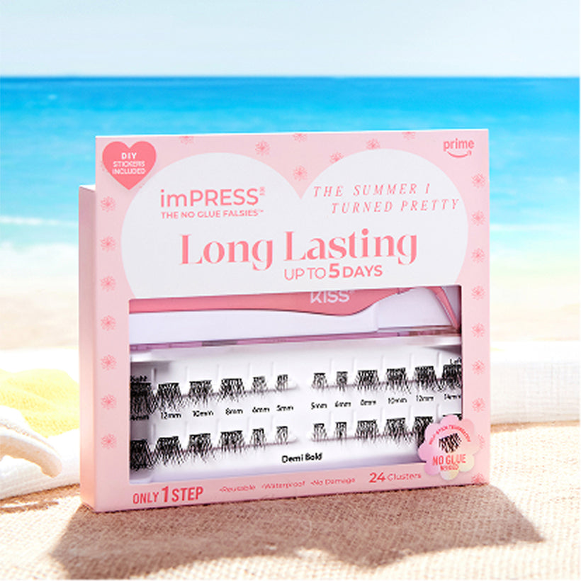 imPRESS Long Lasting press-on nails package on beach background, 24 clusters, up to 5 days wear.