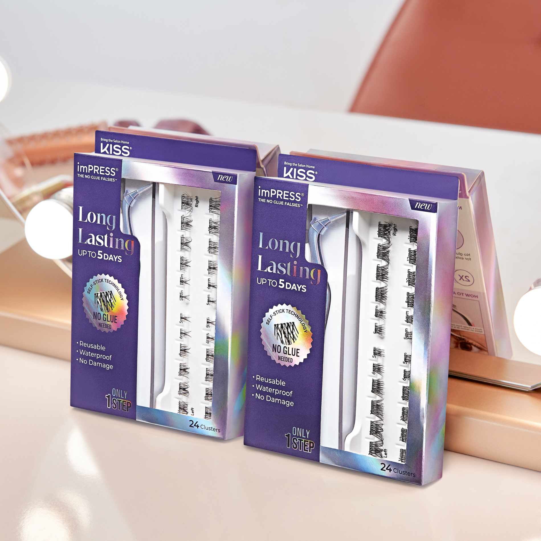 2 packages of imPRESS Long Lasting lash cluster kits side by side showing off 2 different styles of lashes from the collection.